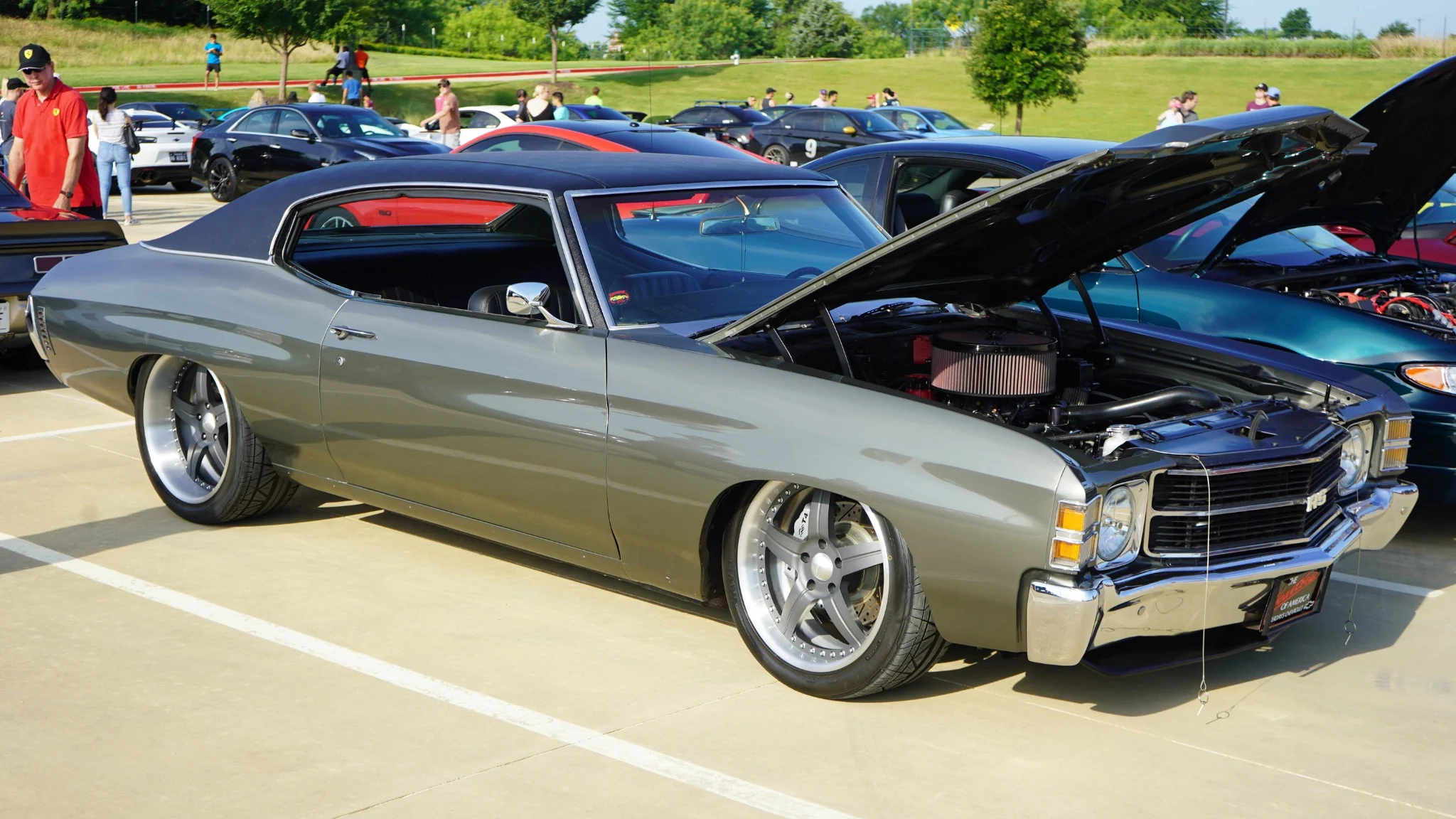 1971 Chevelle Elle at a car show with the hood open