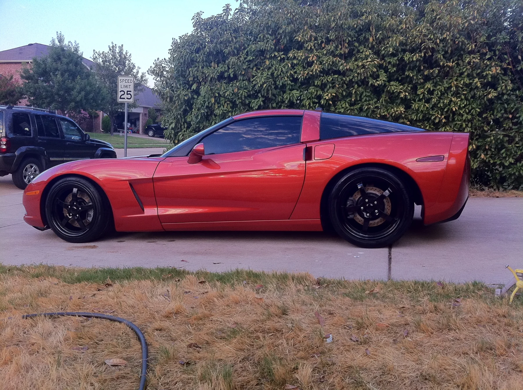 Corvette side profile with dark five-spoke wheels
