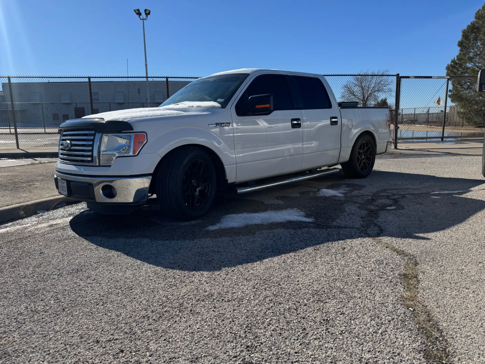 2011 Ford F-150 shop truck front three-quarter view