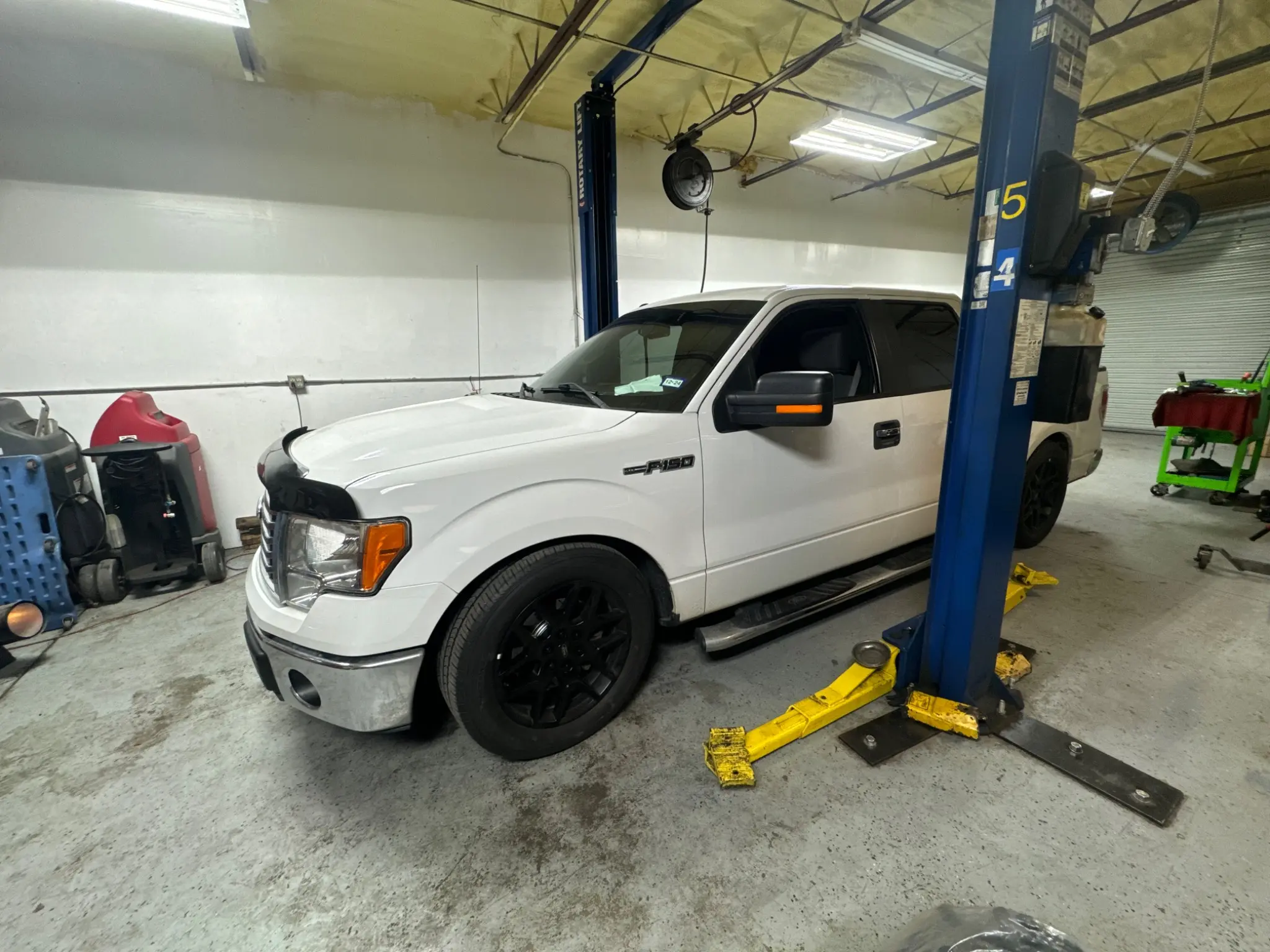 Ford F-150 shop truck inside the workshop